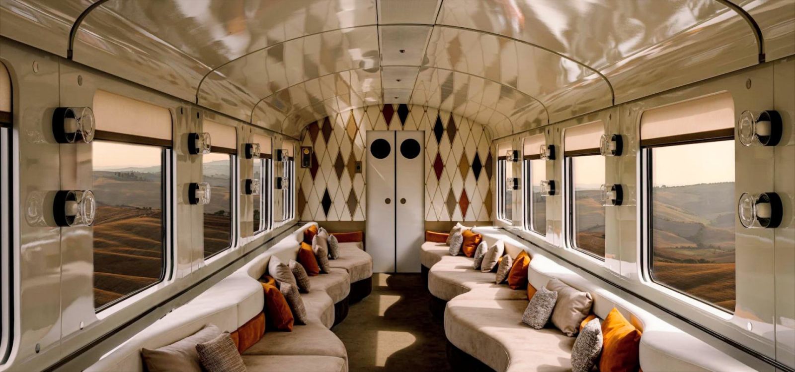 Lounge car with curved seating and Tuscan views